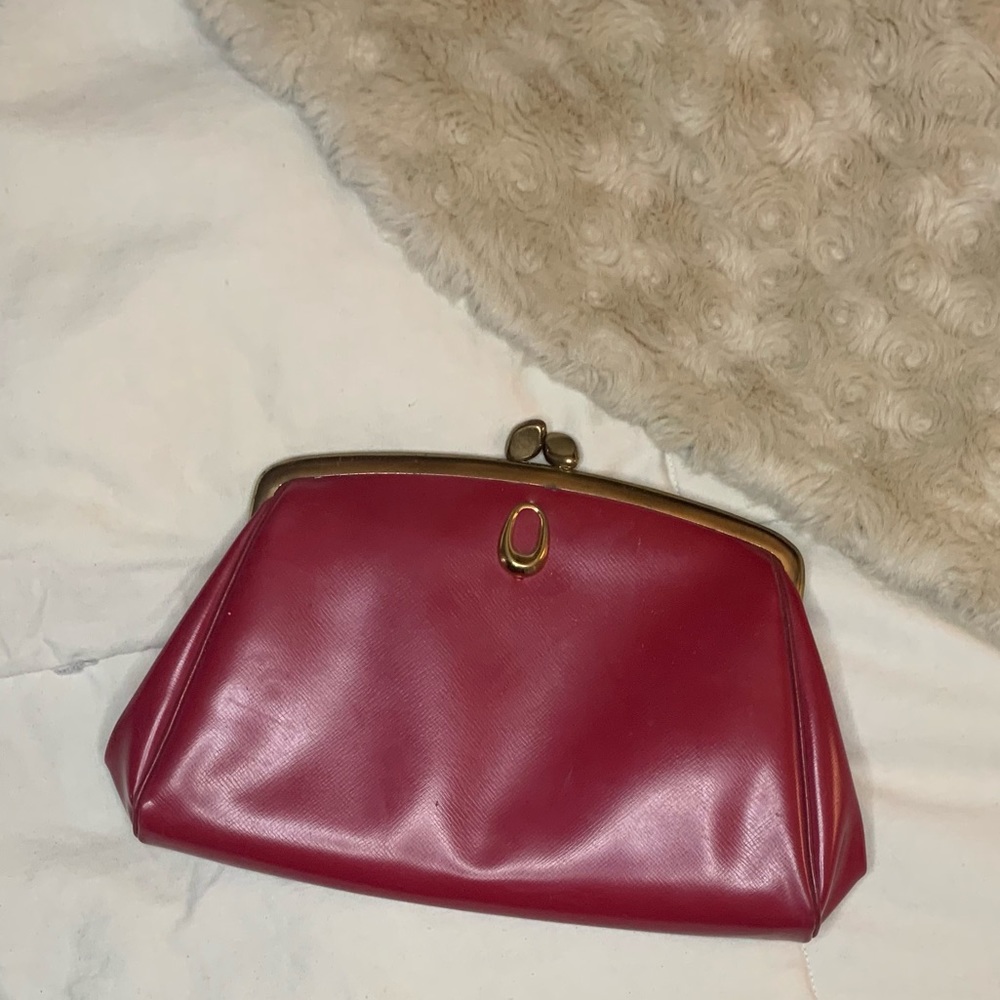 Vintage clutch with genuine leather inside.